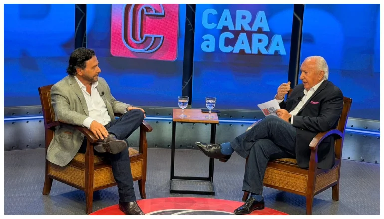 El Gobernador Sáenz junto al periodista Mario Peña.